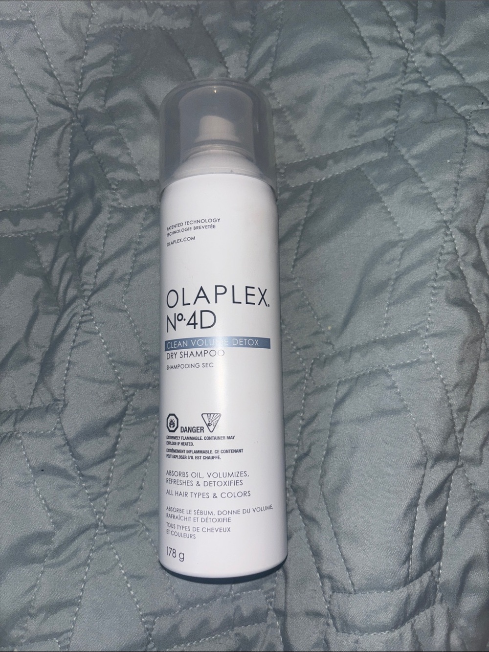 OLAPLEX No.4D Dry Shampoo — White with light blue accent